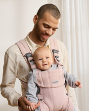 Porte-bébé Harmony tissé chiné Coloris rose clair Babybjörn
