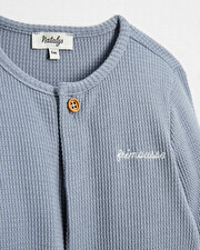 Grenouillère en nid d'abeille brodée Coloris bleu minéral Natalys